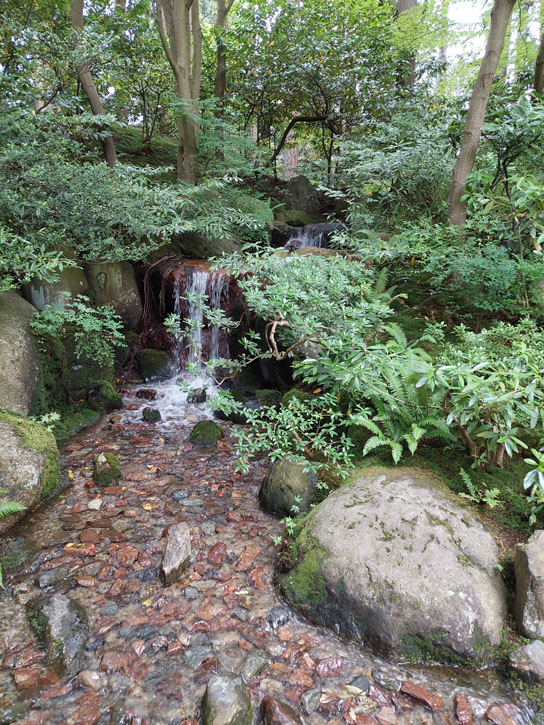Photo of Nitobe Garden in Vancouver, British Colubmia, Canada; A small waterfall.